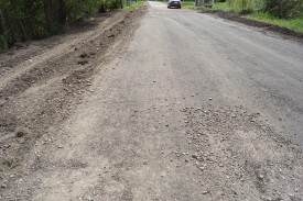 Отремонтировали дорогу через дамбу в селе Абакшино